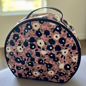 Kate Spade Cedar Street Patsie round travel case pink and black floral